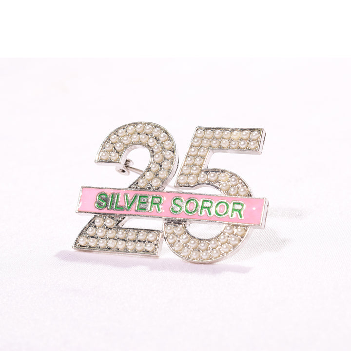 25 Silver Soror pin with pink and green accents, celebrating 25 years in a black sorority. Sorority paraphernalia, accessories, alpha kappa alpha.