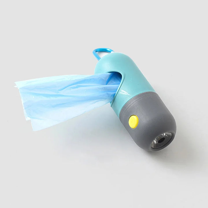 Portable blue and grey dog poop bag dispenser with flashlight, essential for outdoor pet waste management.