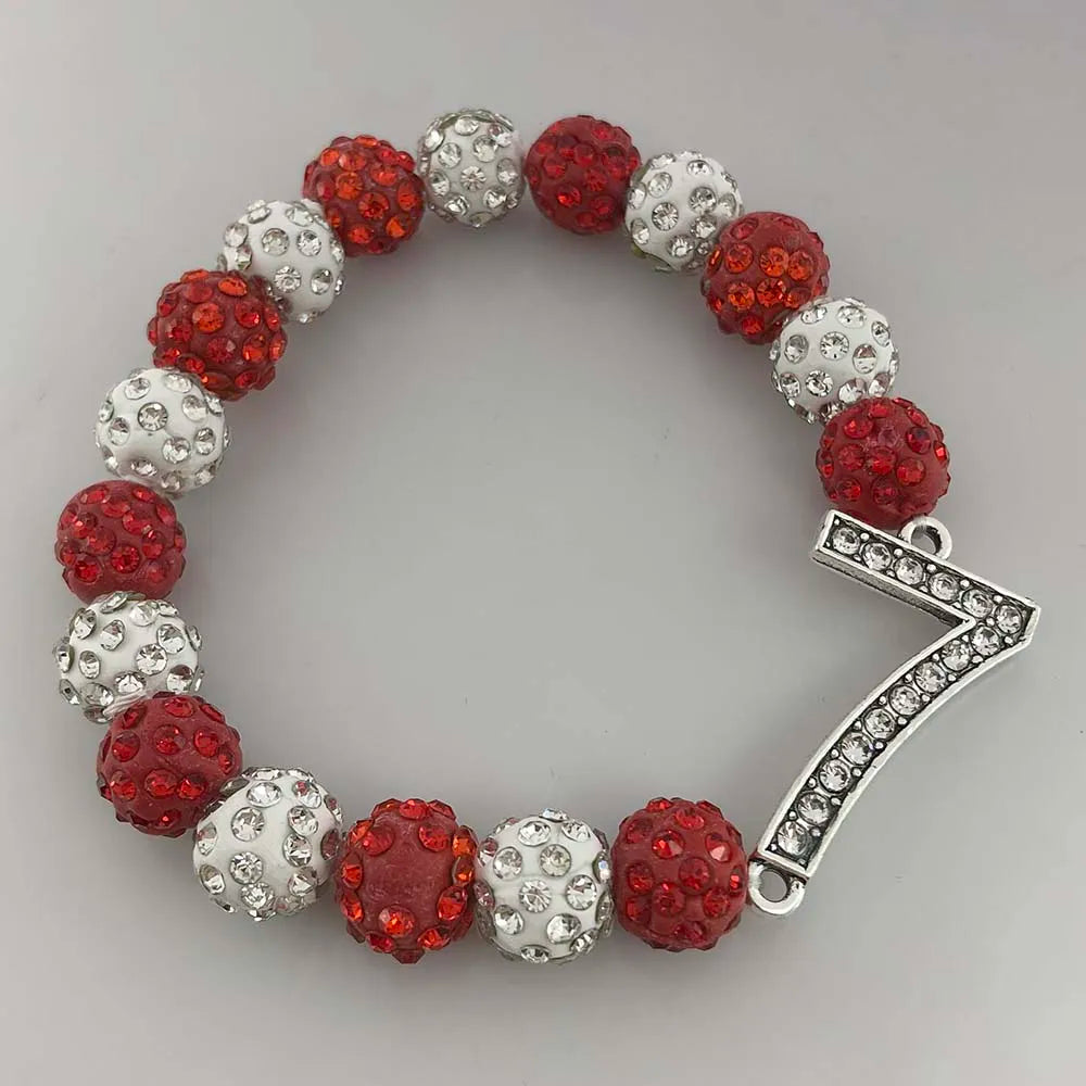 Delta Sigma Theta Number Rhinestone Bracelet featuring red and white beads with a rhinestone number seven charm, sorority paraphernalia