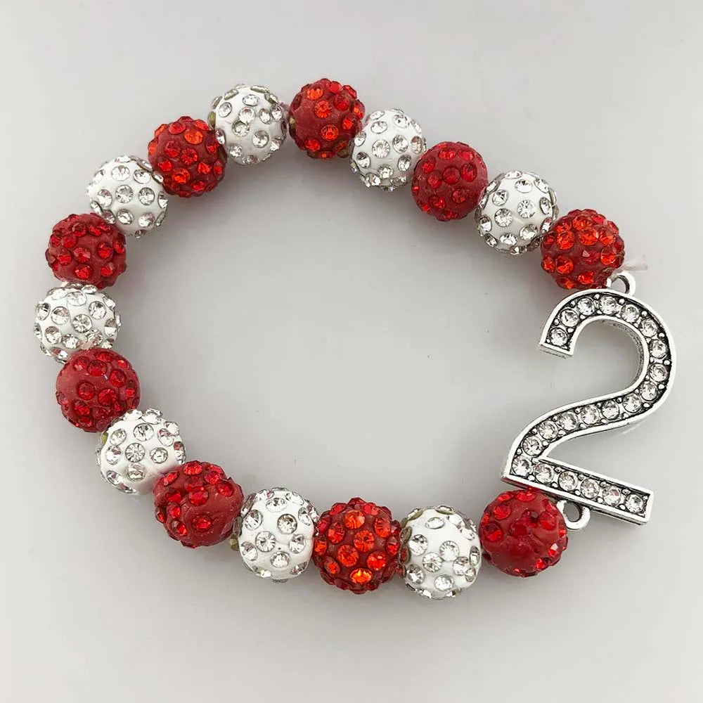 Elegant Delta Sigma Theta number rhinestone bracelet with crimson and cream beads, ideal sorority paraphernalia and black Greek lettered organization accessory.