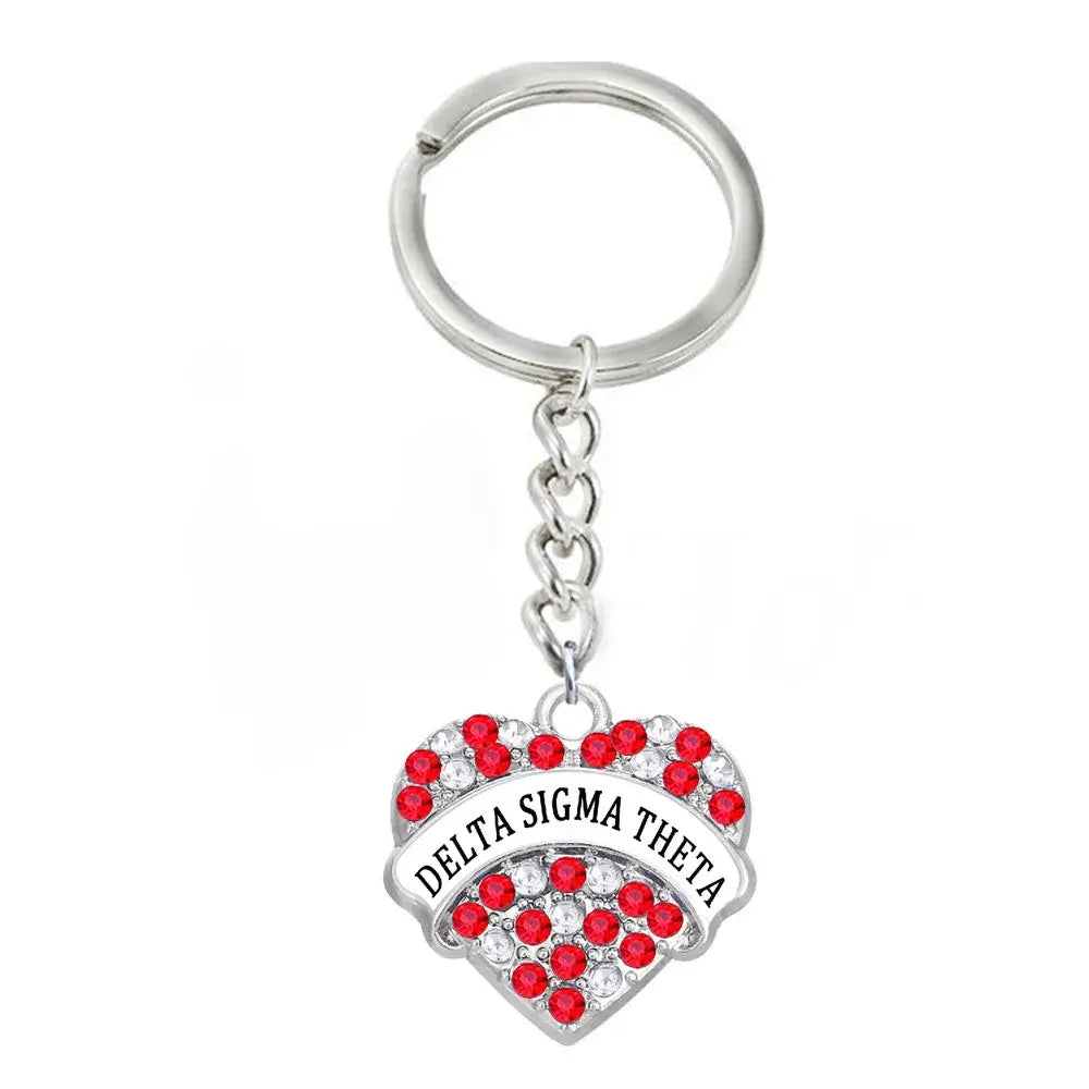 Delta Sigma Theta Heart-Shaped Keychain for sorority paraphernalia, featuring crimson and cream colors, perfect for Delta sorority members.