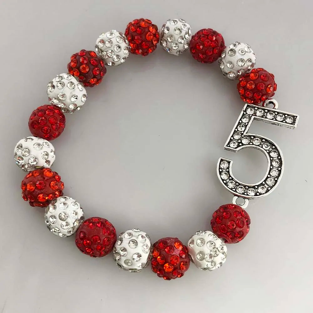 Delta Sigma Theta sorority rhinestone bracelet with red and white beads featuring the number 5. Perfect sorority paraphernalia.