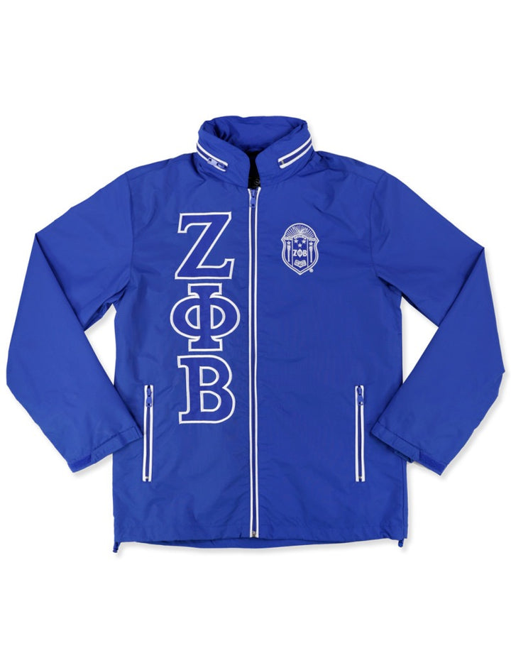 Zeta Windbreaker Jacket in blue with embroidered symbols, perfect for sorority events and stylish outdoor activities.