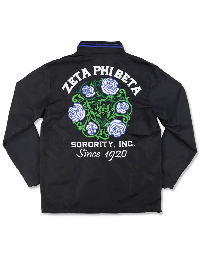 Zeta Windbreaker Jacket featuring embroidered sorority logo and floral design, perfect for Greek gear and outdoor events.