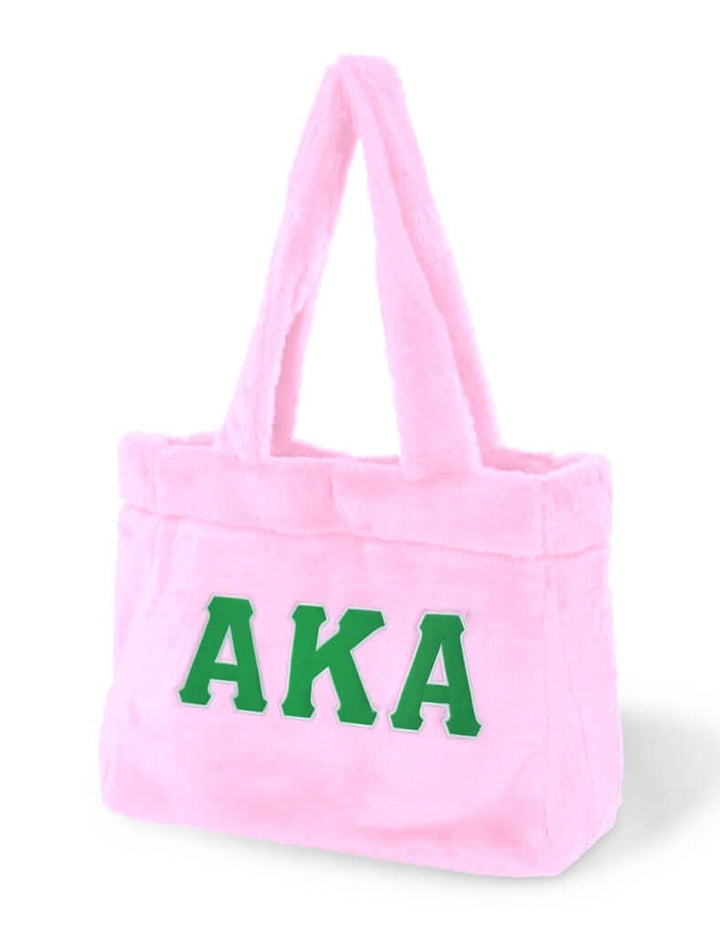 Pink AKA fur tote bag perfect for sorority and fraternity paraphernalia, showcasing Greek gear style and winter cuteness.