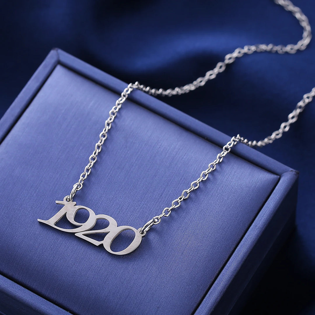 Stainless steel Zeta Phi Beta 1920 necklace for black sorority paraphernalia and accessories on a blue box