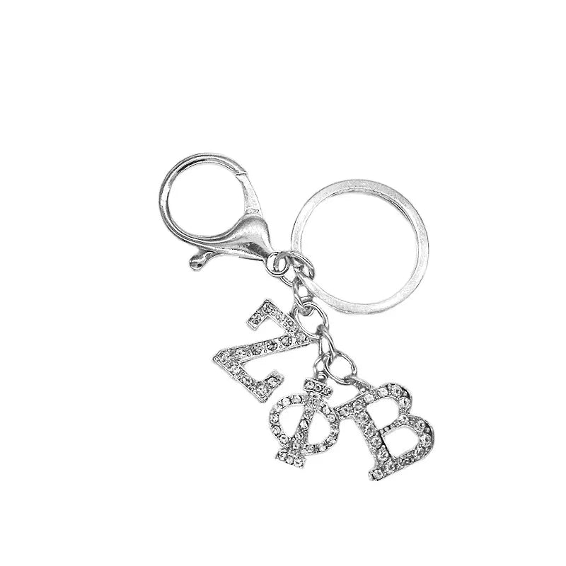 Zeta Phi Beta sorority rhinestone keychain accessory for bags or keys, featuring sparkling Greek letters, ideal sorority paraphernalia and gifts.