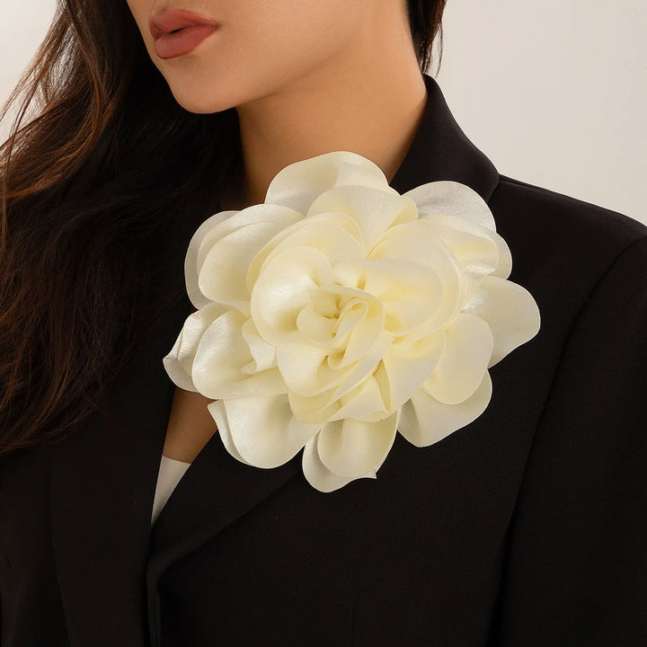 Elegant sorority flower brooch on black blazer, perfect sorority paraphernalia for any occasion