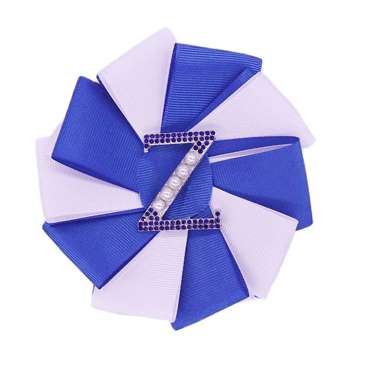 Royal blue and white Zeta Phi Beta brooch with pearl and rhinestone "Z" center, sorority paraphernalia, black greek lettered organization.