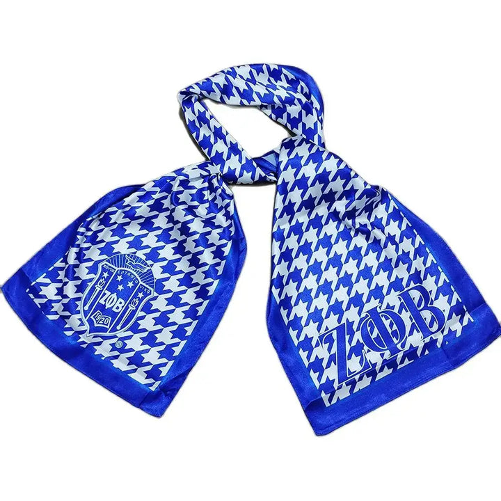 Stylish Zeta Phi Beta scarf featuring a houndstooth pattern and logo, perfect Greek gear for sorority members.