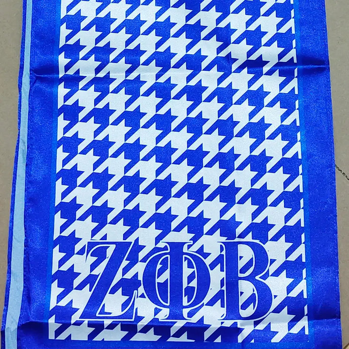 Stylish Zeta Phi Beta scarf featuring a houndstooth design, perfect greek gear for sorority members and fraternity paraphernalia.