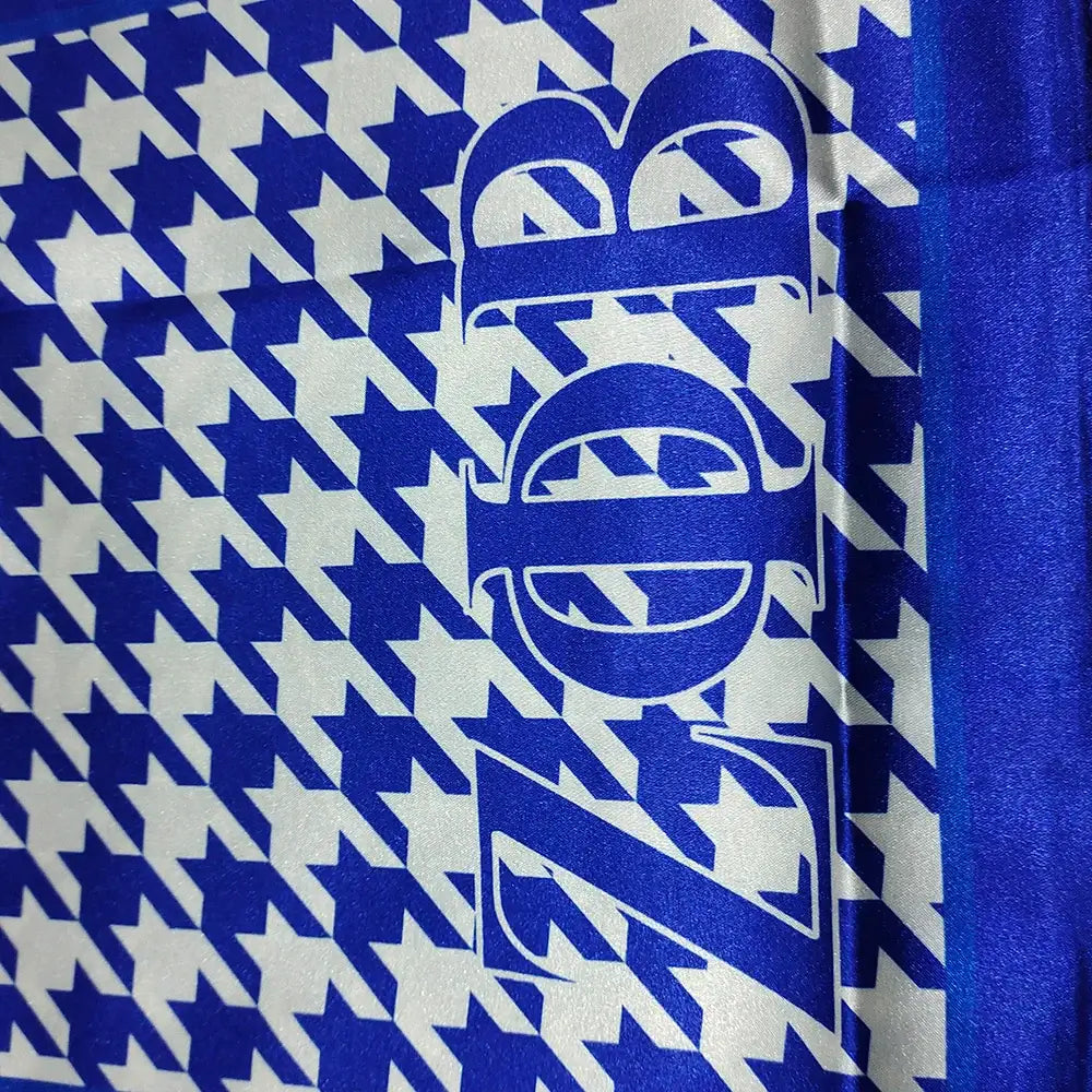 Stylish Zeta Phi Beta scarf featuring blue houndstooth pattern, perfect for sorority paraphernalia and Greek gear.