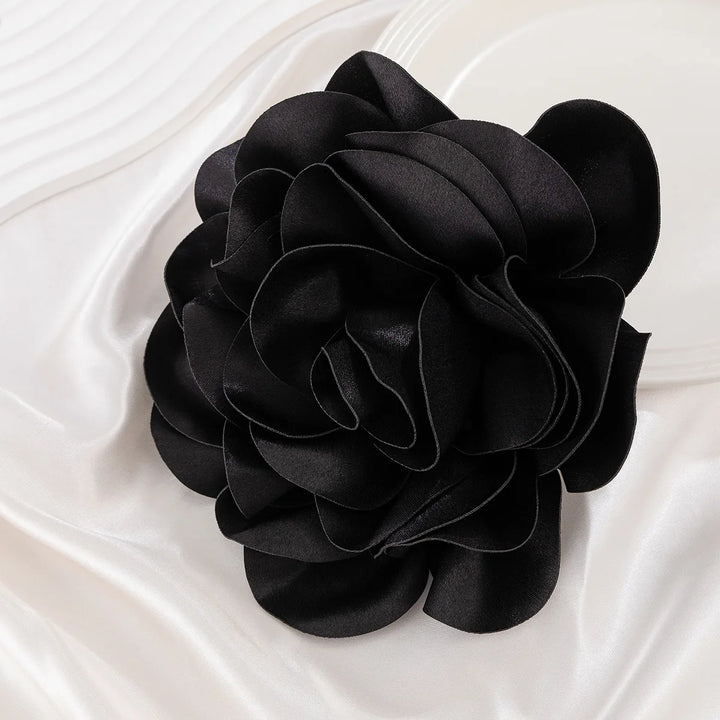 Classic black sorority flower brooch on satin, perfect sorority paraphernalia for any occasion, ideal for black Greek lettered organization members