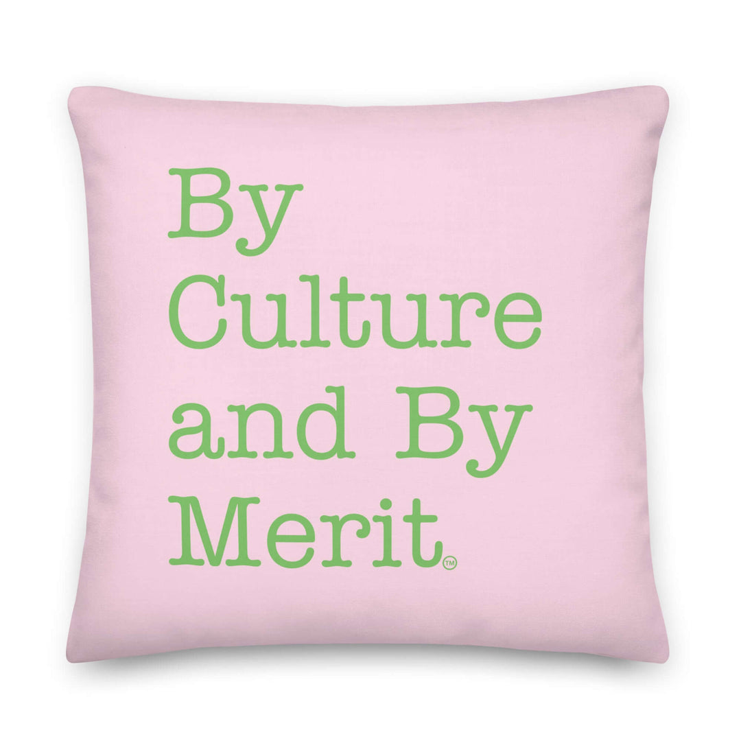 Pink pillow with "By Culture and By Merit" in bold green typography, celebrating sisterhood and sorority pride.