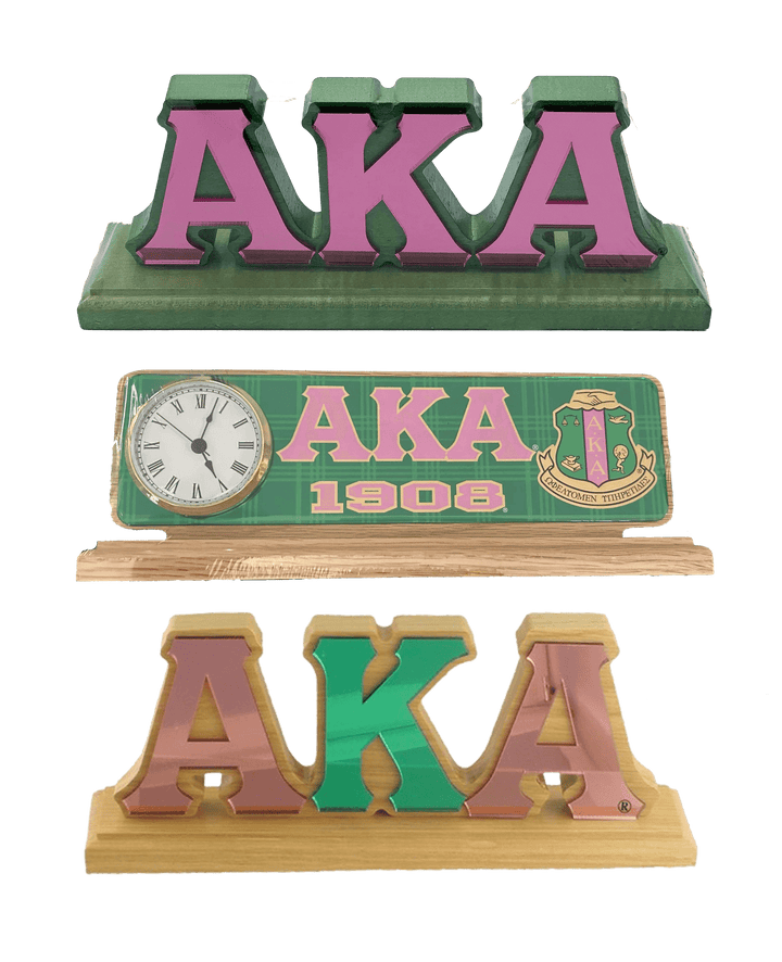 Wooden AKA desktop plaques with pink and green letters, perfect Greek gear for sorority and fraternity paraphernalia.