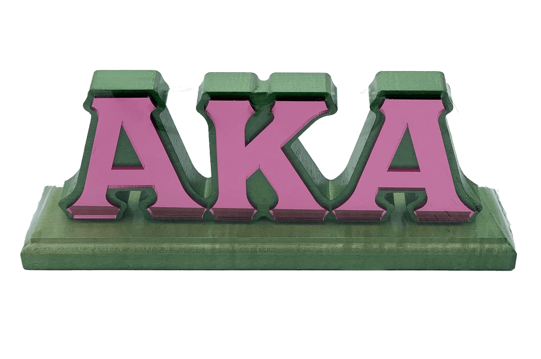 Wooden desktop plaque featuring acrylic pink 'AKA' letters, perfect sorority and fraternity paraphernalia.