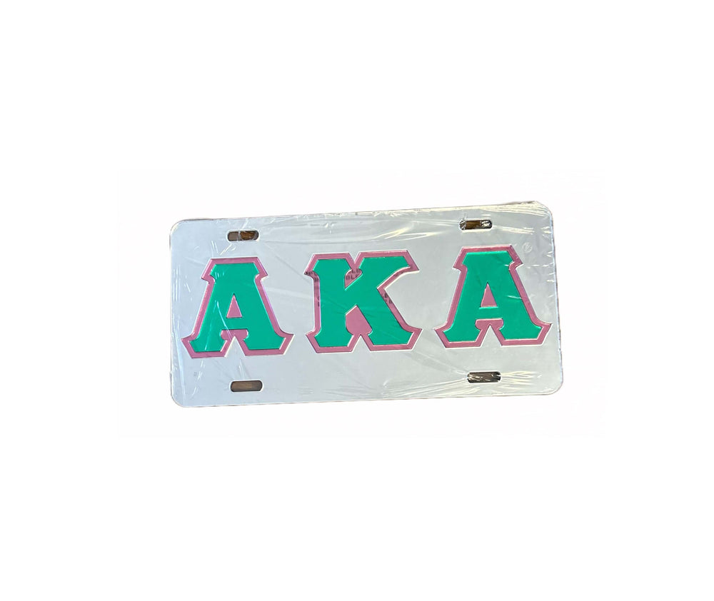 AKA car tag featuring bold green and pink letters, representing Alpha Kappa Alpha Sorority, durable and stylish Greek gear.