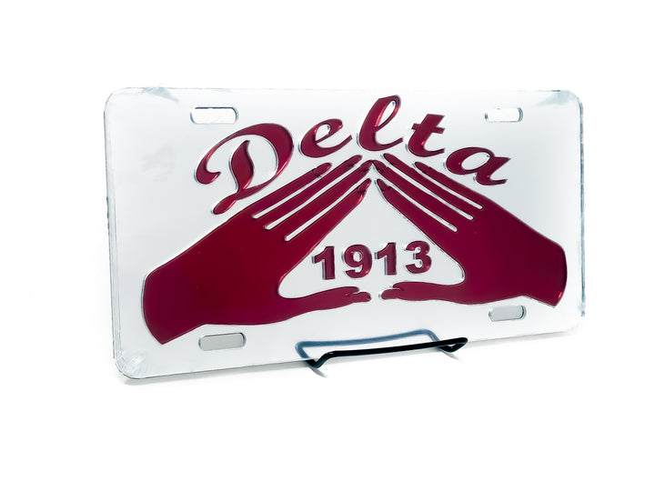 Delta Sigma Theta car tag featuring iconic pyramid hands symbol and 1913, perfect for showcasing sorority pride.