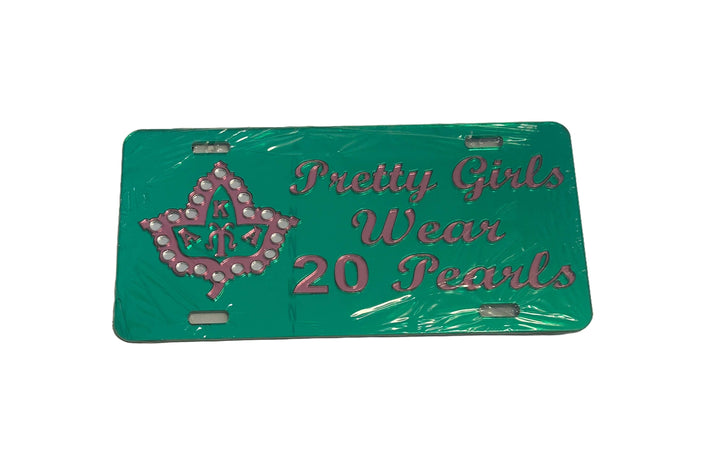 AKA car tag featuring "Pretty Girls Wear 20 Pearls" design, perfect sorority paraphernalia for proud members.