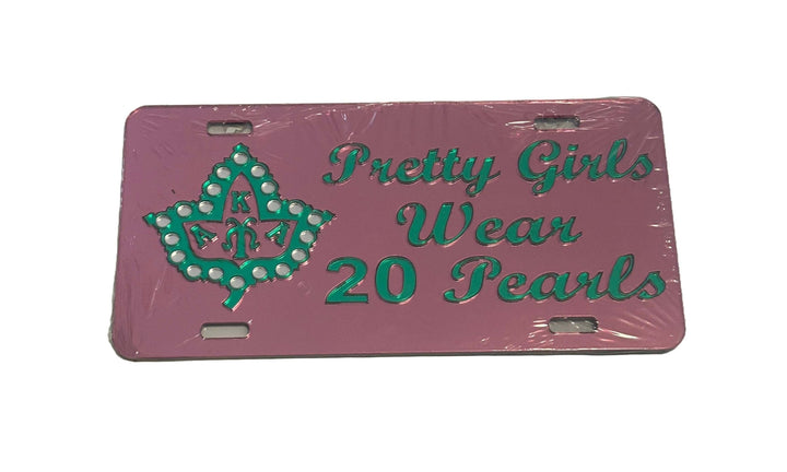 AKA car tag featuring "Pretty Girls Wear 20 Pearls" with a leaf design, perfect for sorority and fraternity paraphernalia.