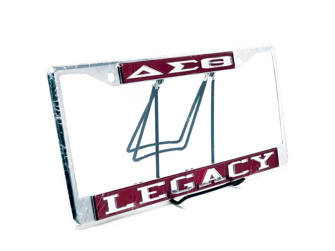 Delta Sigma Theta legacy car tag frame showcasing sorority pride with a bold design in red and silver. Perfect Greek gear accessory.