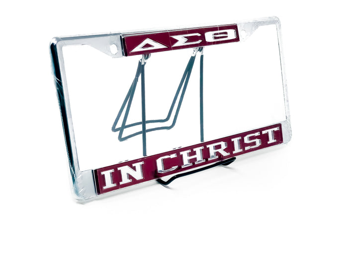 Delta Sigma Theta car tag frame with "In Christ" message, a stylish sorority paraphernalia for proud members.