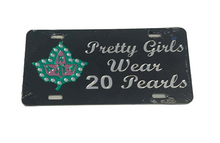 AKA car tag featuring "Pretty Girls Wear 20 Pearls" design, showcasing sorority spirit and Greek gear elegance.