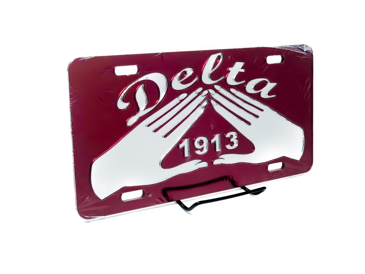 Delta Car Tag featuring iconic pyramid hands symbol, showcasing sorority pride and Greek gear for members.