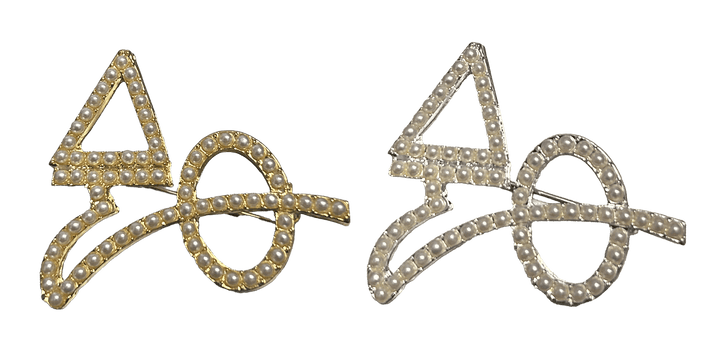 Delta Pins in gold and silver featuring pearl symbols, perfect for sorority and fraternity paraphernalia and Greek gear.