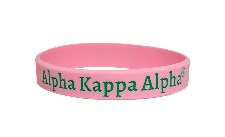 Pink silicone bracelet featuring Greek letters for Alpha Kappa Alpha, perfect sorority and fraternity paraphernalia.