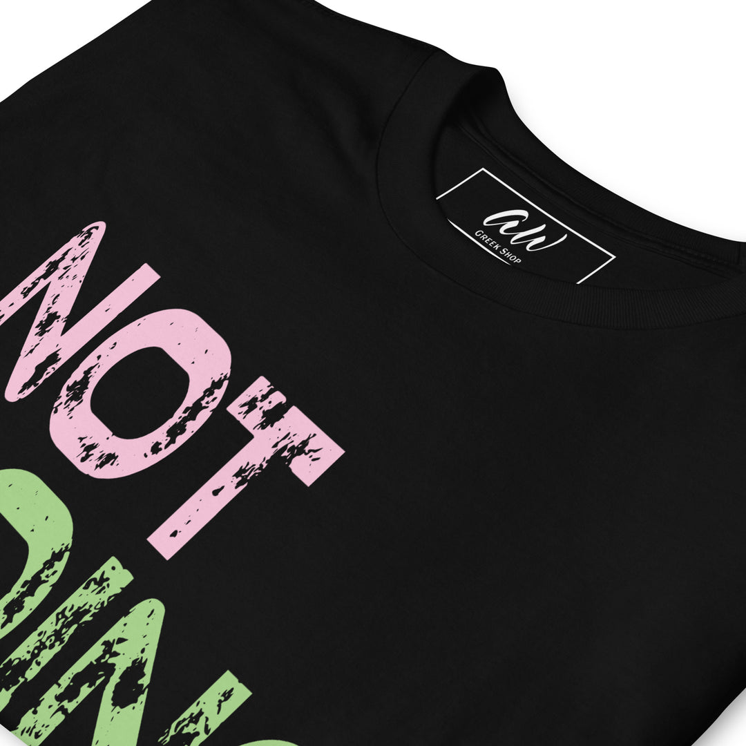 Close-up of Pink and Green "Not Going Back" T-Shirt for Vote 2024, ideal for black greek lettered organizations and women's sorority apparel.