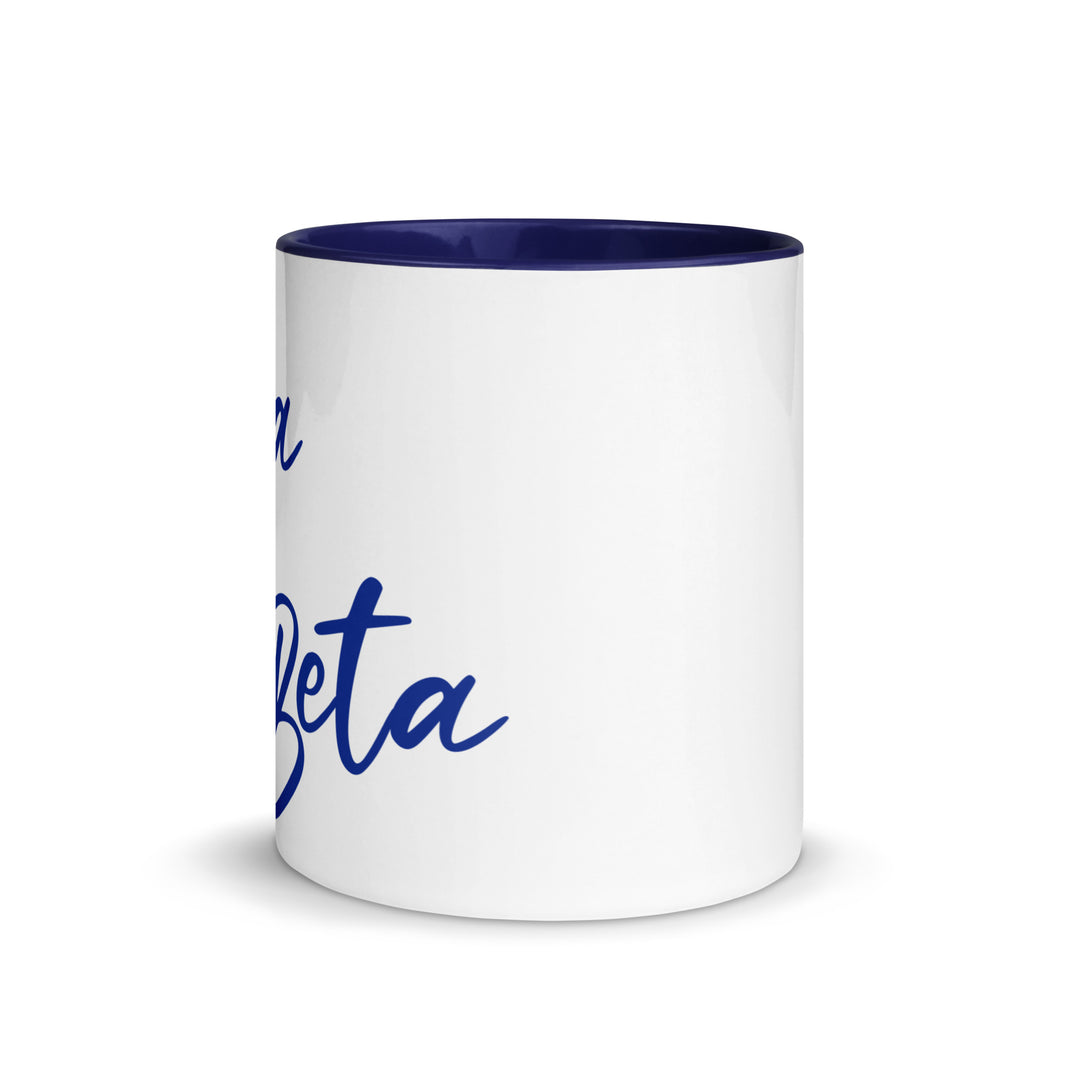 Zeta Script Mug featuring a blue interior, perfect for sorority and fraternity coffee routines in vibrant Greek gear.